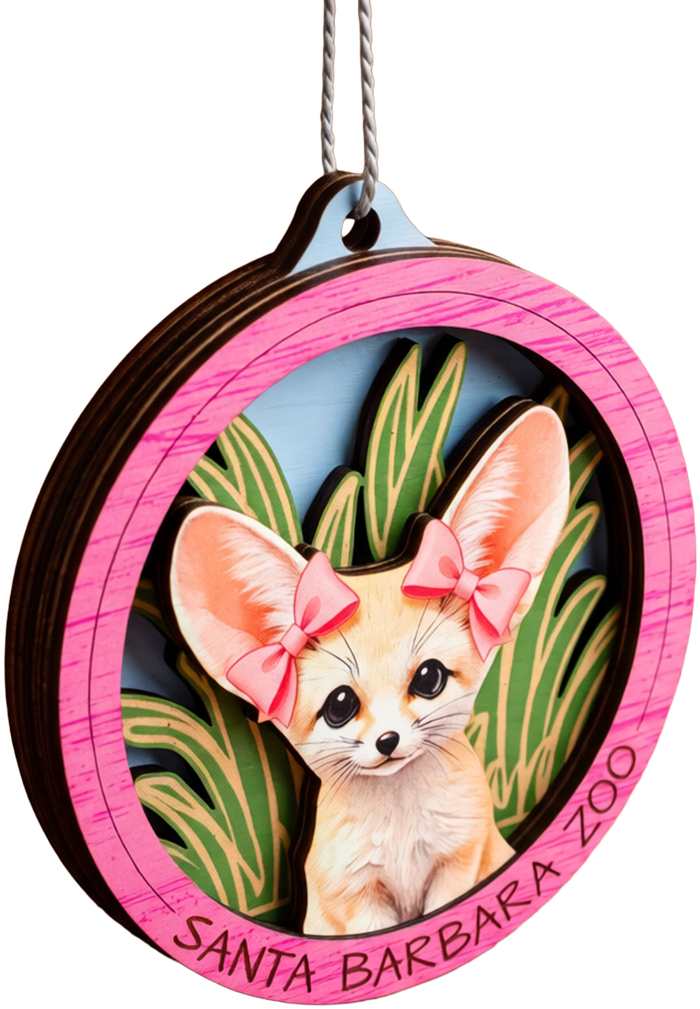 Custom wood ornament featuring a fennec fox with pink bows, made for the Santa Barbara Zoo