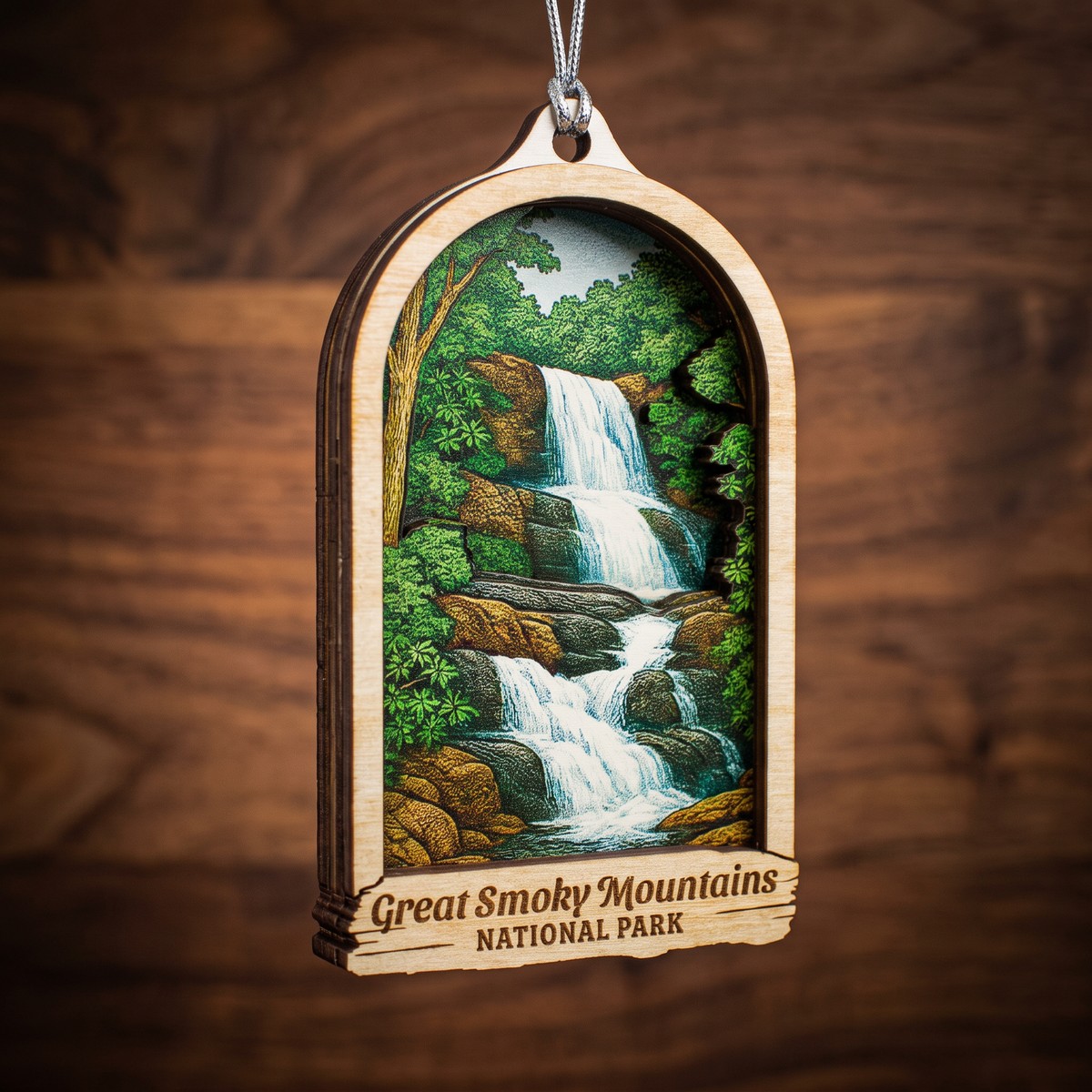 Custom laser-engraved wood ornament of a Great Smoky Mountains National Park waterfall scene